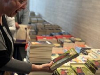 Rebekah Postupak loving the offerings at this year&#039;s Book Depot for our 60th Anniversary Nebula Awards Conference.