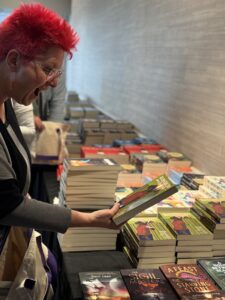 Rebekah Postupak loving the offerings at this year&#039;s Book Depot for our 60th Anniversary Nebula Awards Conference.