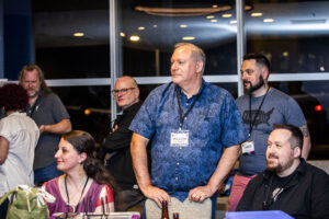 Nebula Conference Panelist William Ledbetter leads the scene in an engaged group of conference attendees. (Photo Credit: Kaitrin Acuna, 2025)