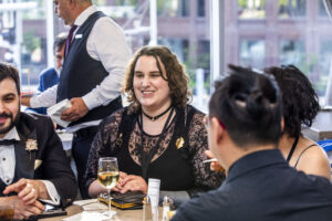 Tony Howard-Arias and Abby Howard celebrating at our 60th Anniversary Nebula Awards Conference. (Photo Credit: Kaitrin Acuna, 2025.)