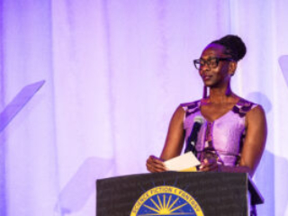 SFWA Executive Director Isis Asare introduces a winner at the Nebula Awards Ceremony held on June 7. (Photo Credit: Kaitrin Acuna, 2025.)