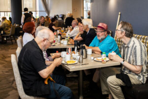 SFWA Board Member Steven D. Brewer joins Past SFWA Presidents Anthony Eichenlaub (also a current Board Member) and Joe Haldeman at our Breakfast of the Presidents. (Photo Credit: Kaitrin Acuna, 2025.)
