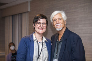 SFWA President Kate Ristau and Past SFWA President Michael Capobianco share a moment in time and space at the 60th Anniversary Nebula Awards Conference. (Photo Credit: Kaitrin Acuna, 2025.)