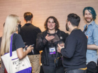 Nebula Finalists Jingjing Xiao, Abby Howard, Tony Howard-Arias, and Paul Dean mingle at our 60th Anniversary Nebula Awards Conference. (Photo Credit: Kaitrin Acuna, 2025.)