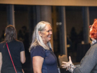 Michelle C. Leigh and Rosemary Claire Smith share a moment of delight at the 60th Anniversary Nebula Awards Conference. (Photo Credit: Kaitrin Acuna, 2025.)
