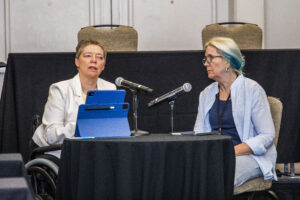 SFWA Grand Master Nicola Griffith, in a special conversation led by fellow author and wife Kelley Eskridge. (Photo Credit: Kaitrin Acuna, 2025.)
