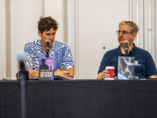 Panelists Michael Solis and Mark D. Owen discussing science fiction at the 60th Anniversary Nebula Awards Conference. (Photo Credit: Kaitrin Acuna, 2025.)