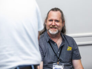 Brian C. E. Buhl gives us a grin at our Nebula Awards Conference. (Photo Credit: Kaitrin Acuna, 2025.)