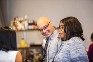 Kagan Tumer and SFWA Board Member Christine Taylor-Butler enjoy conversation at our 60th Anniversary Nebula Awards Conference. (Photo Credit: Kaitrin Acuna, 2025.)