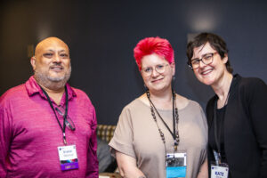 Nebula attendee Shahid Mahmud with Nebula Ceremony Planner Rebekah Postupak and SFWA President Kate Ristau. (Photo Credit: Kaitrin Acuna, 2025.)