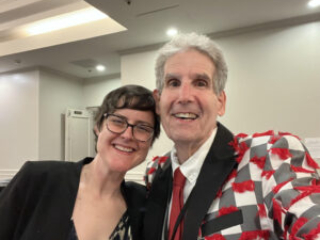 SFWA President Kate Ristau and Scott Edelman share a smile at our 60th Anniversary Nebula Awards Conference. (Photo Credit: Scott Edelman, 2025.)
